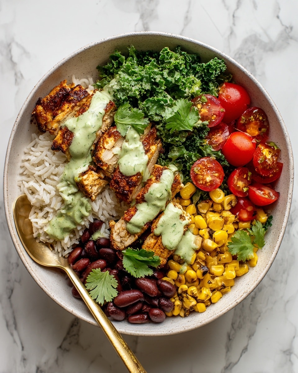 The dish is served in a white bowl on a white marbled surface. At the bottom, there is a layer of white rice with scattered yellow corn kernels. On one side, there are dark red beans next to the rice. Grilled brown chicken pieces are placed above the rice and beans, with corn sprinkled on top. Next to the chicken, there is a bright green layer of kale leaves. To the side of the kale, there are halved red cherry tomatoes. A pale green creamy sauce is drizzled over the chicken, kale, and tomatoes. A few fresh green cilantro leaves are used as garnish. A gold spoon is resting inside the bowl. Photo taken with an iphone --ar 4:5 --v 7