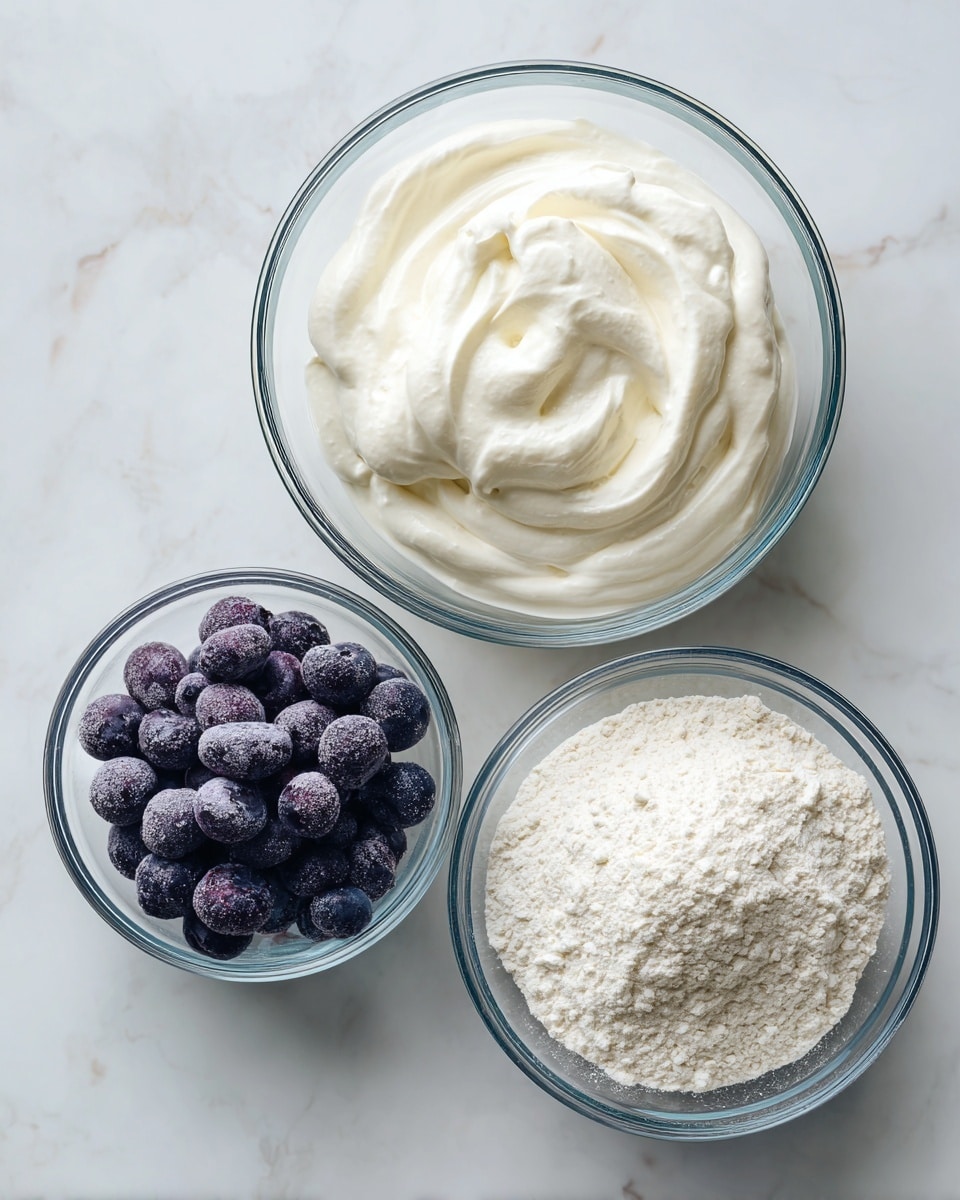 The image shows several slices of a golden-brown scone with a slightly rough texture on the outside. Each slice reveals a thick layer of white cream spread inside, with dark purple blueberries embedded in the soft, light-colored dough, some blueberries slightly bursting and releasing juice. The scones are placed on a white plate with a subtle shine, set on a white marbled surface, with two loose blueberries near the plate. A woman's hand is gently holding one slice on the left side of the image. Photo taken with an iphone --ar 4:5 --v 7