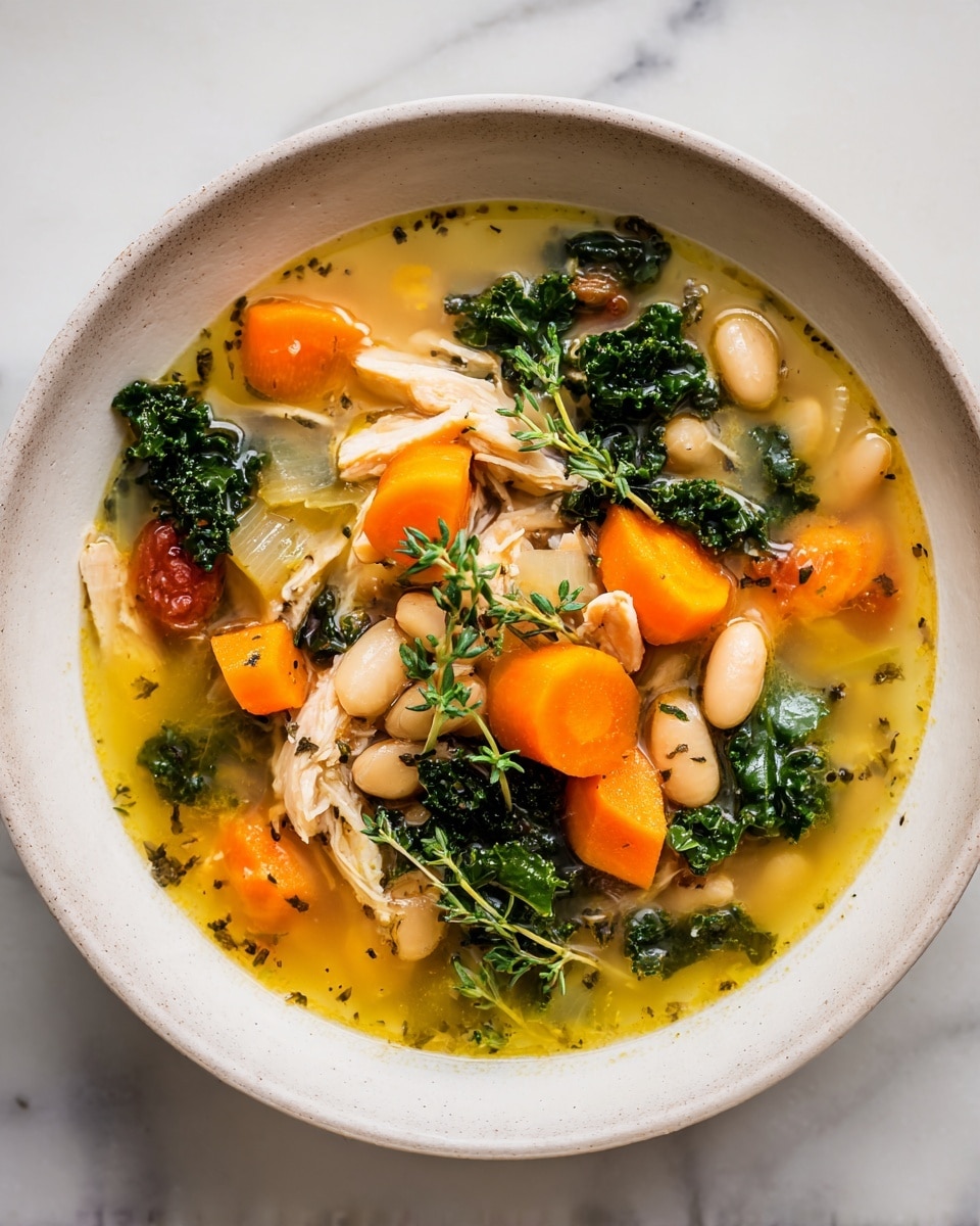 A close-up of a white bowl filled with a thick soup containing multiple layers of ingredients: bright orange carrot slices, small white beans, shredded light brown chicken pieces, green kale leaves, and diced pale yellow onions, all mixed in a clear golden broth with visible herbs and spices floating on top, resting on a white marbled surface photo taken with an iphone --ar 4:5 --v 7