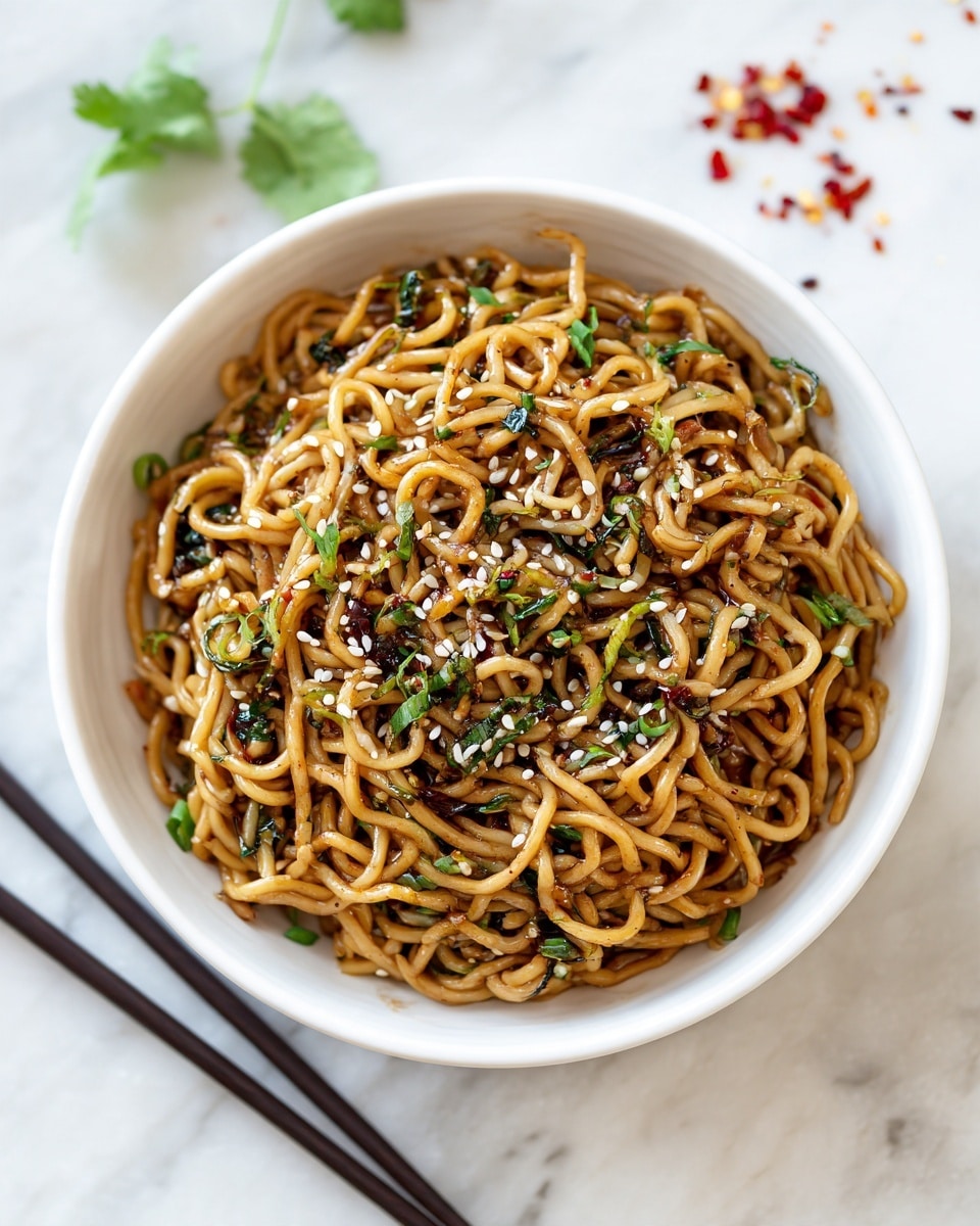 A dark metal tray holds nine small white bowls and two blocks of ramen noodles. The top left has two wavy, light brown ramen noodle blocks. At the top right, a white bowl contains chopped green onions with small pieces of garlic and ginger visible. Below the noodles and green onion bowl are eight small white bowls arranged in rows: a dark brown, shiny soy sauce; a light cream-colored rice vinegar; a golden brown sesame oil; a dark amber honey; a transparent light brown oil; a chunky bright red chili garlic sauce; a smooth deep red sriracha; and crushed dark red pepper flakes mixed with lighter seeds. The tray sits on a white marbled surface. Photo taken with an iphone --ar 4:5 --v 7
